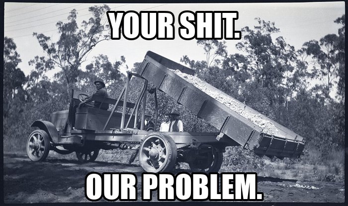 1930 tip truck dumping a load of gravel
