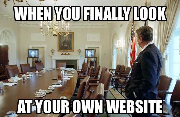 Man alone in a conference room watching a television